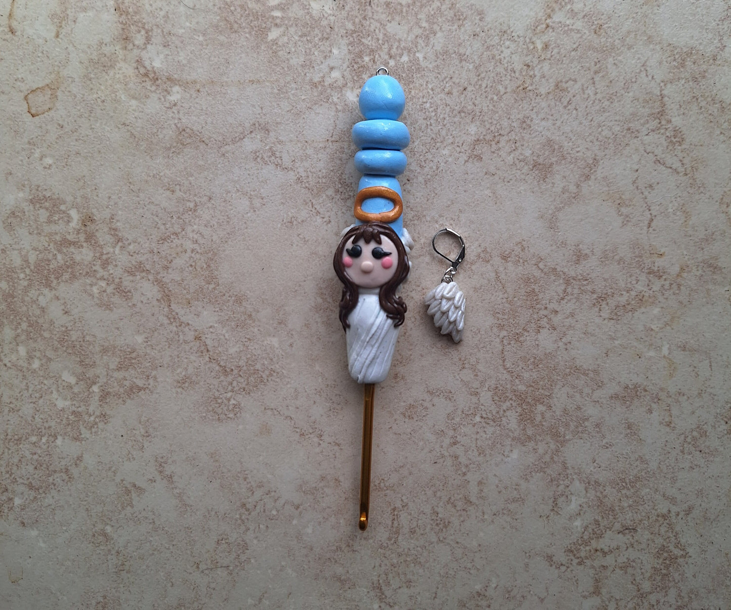 Polymer clay angel halo crochet hook with wing stitch marker