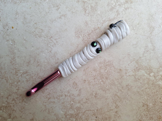 Polymer clay Halloween mummy with spider crochet hook