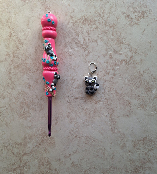 Polymer clay pink glitter lemur on branch crochet hook