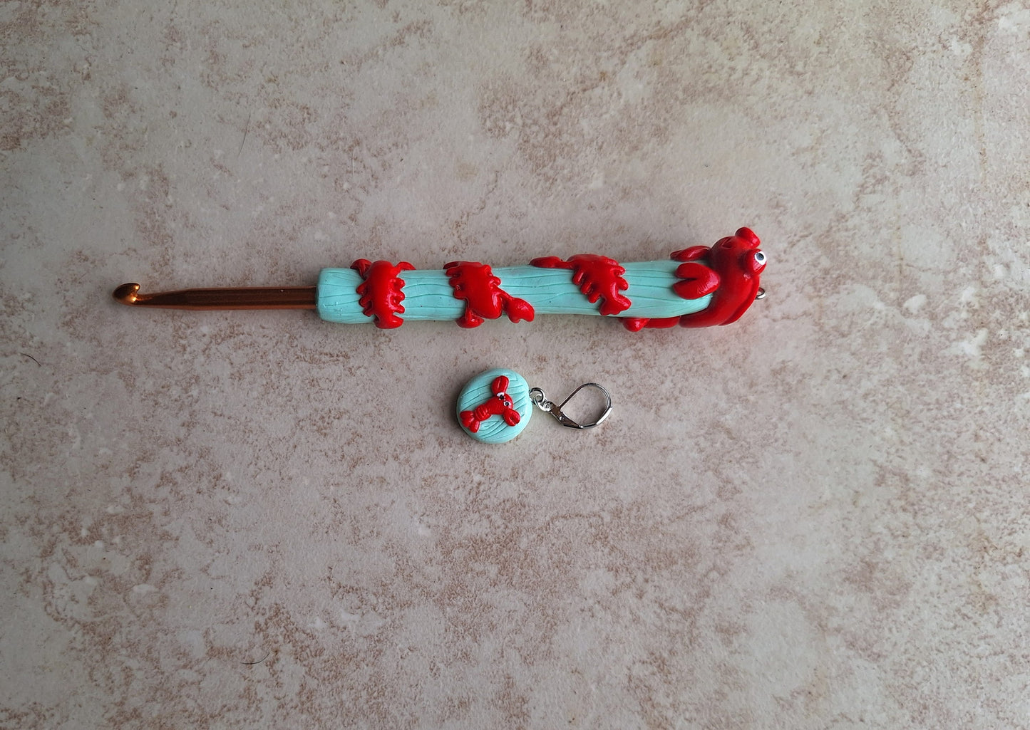 Polymer clay lobster on mint nautical crochet hook with stitch marker
