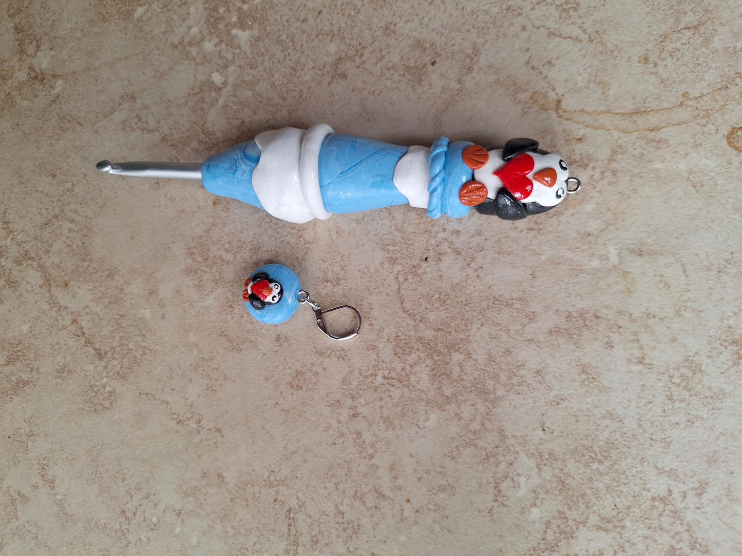 Polymer clay icy heart penguin crochet hook with stitch marker