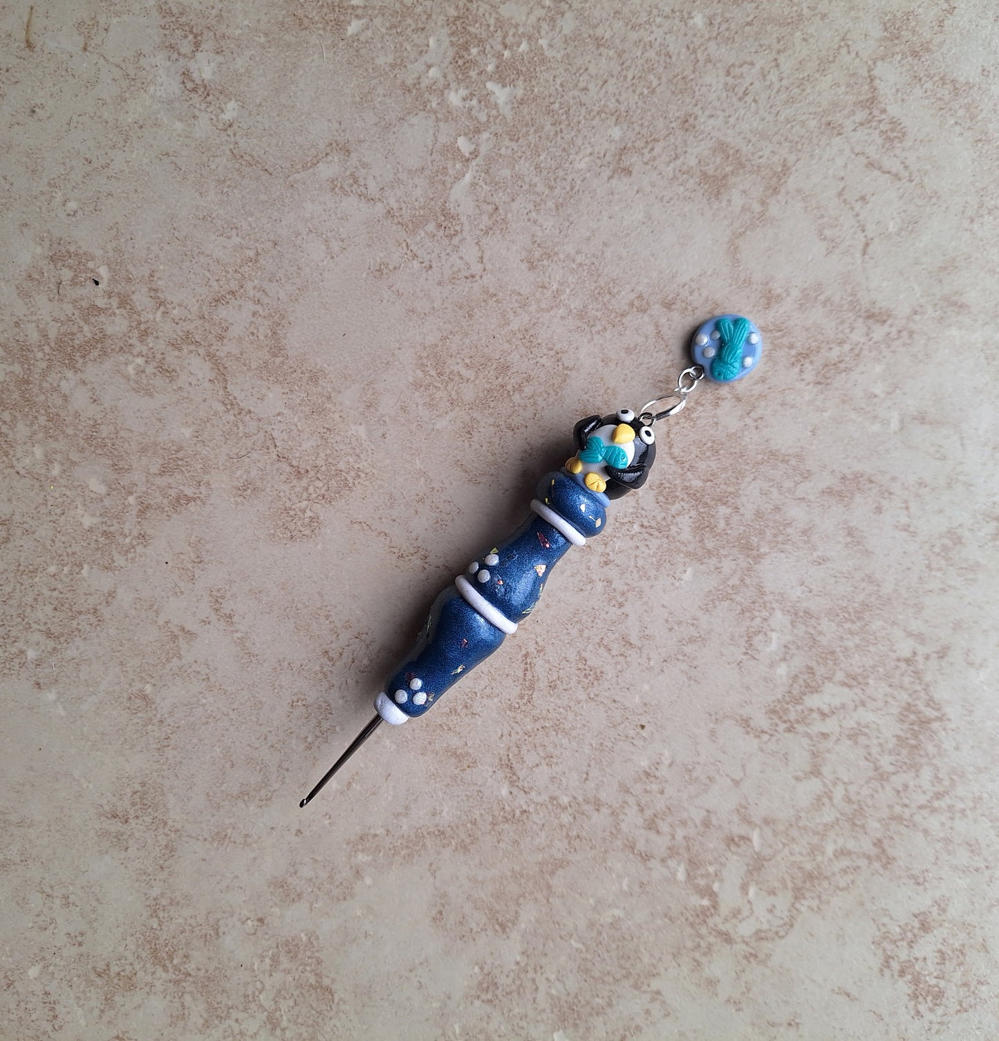 Polymer clay navy pearl penguin crochet hook with stitch marker