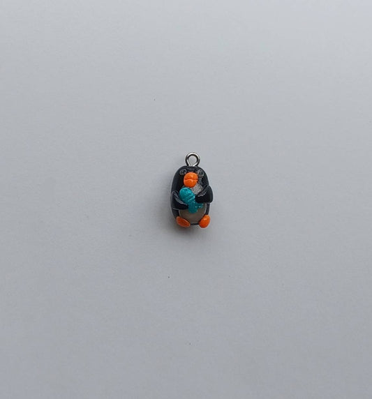 Kawaii penguin charms / polymer clay penguin holding fish charms / kawaii animal charms / kawaii penguin jewelry