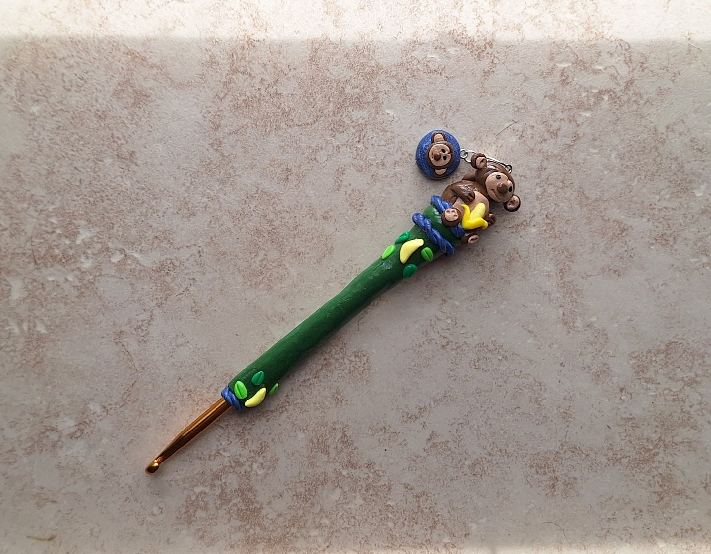Polymer clay monkey banana jungle crochet hook with stitch marker