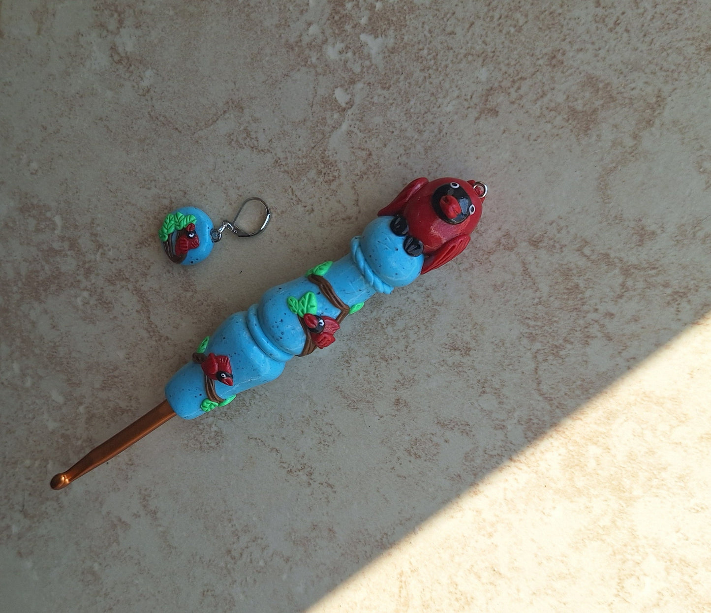 Polymer clay cardinal bird on turquoise clay crochet hook