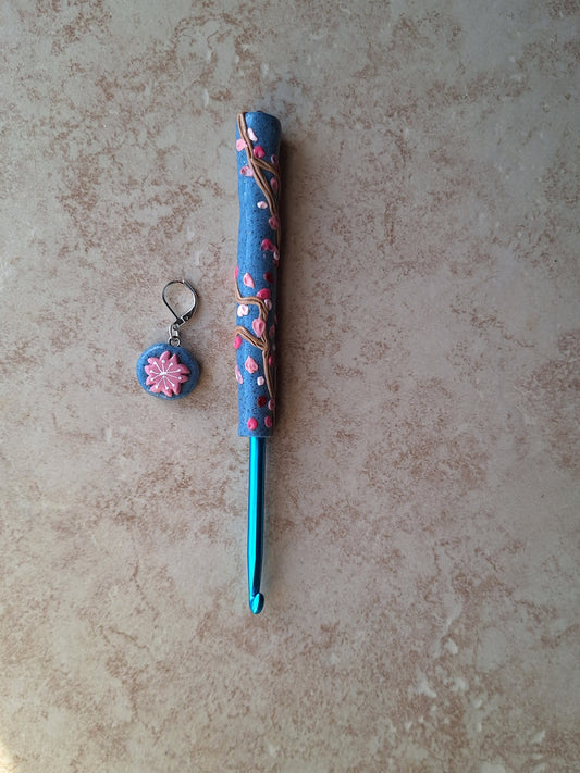Polymer clay spring floral Sakura on blue crochet hook