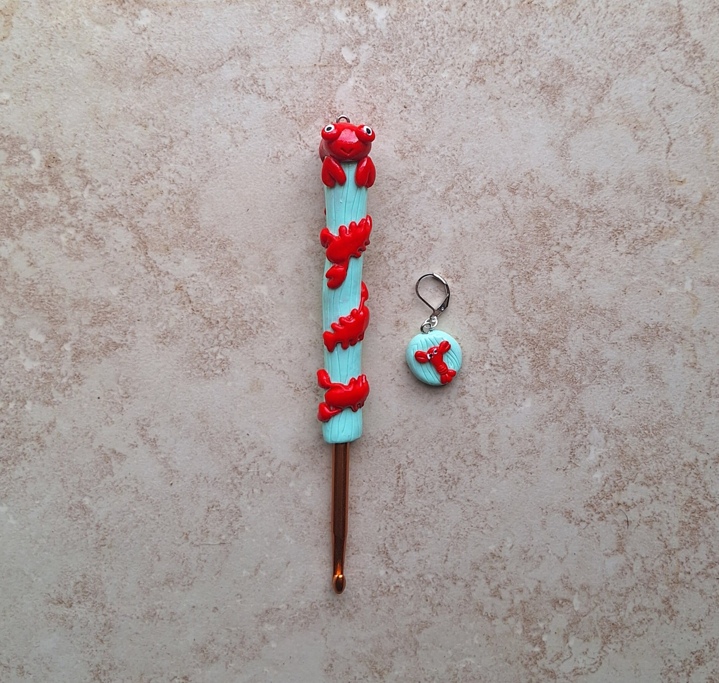 Polymer clay lobster on mint nautical crochet hook with stitch marker