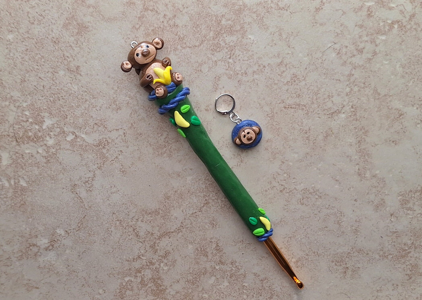 Polymer clay monkey banana jungle crochet hook with stitch marker