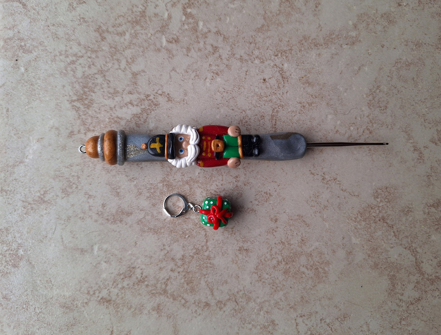 Polymer clay silver gold marbled nutcracker holiday Christmas crochet hook with stitch marker