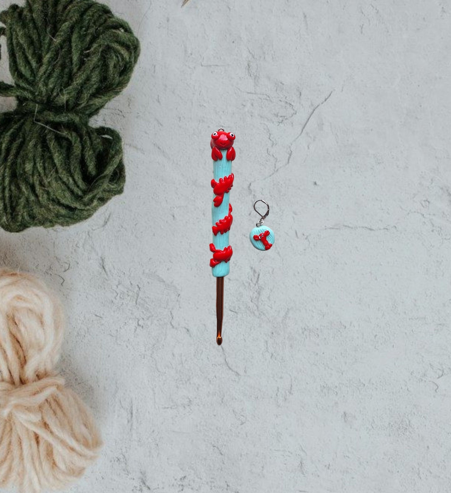 Polymer clay lobster on mint nautical crochet hook with stitch marker