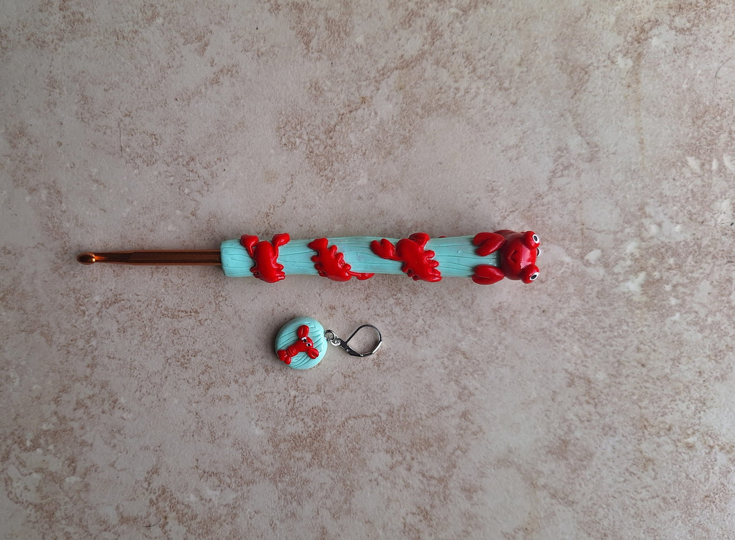 Polymer clay lobster on mint nautical crochet hook with stitch marker