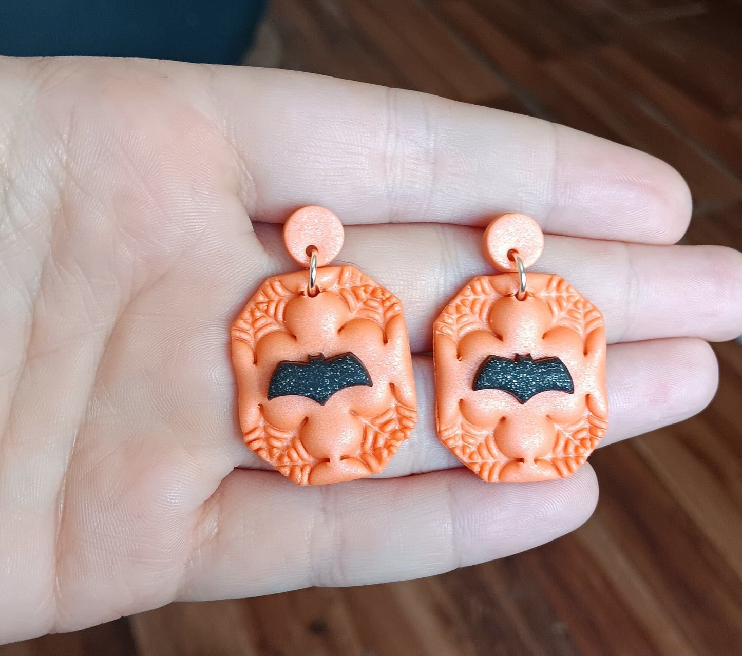 Kawaii orange spiderweb bat earrings / polymer clay dangle stud earrings / flying bat Halloween holiday jewelry / spider web earrings