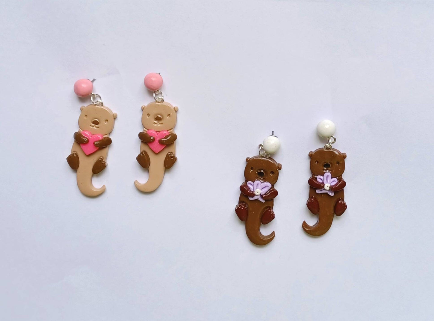 Kawaii otter earrings / polymer clay otter with heart earrings / kawaii floral jewelry / clay otter with flower earrings