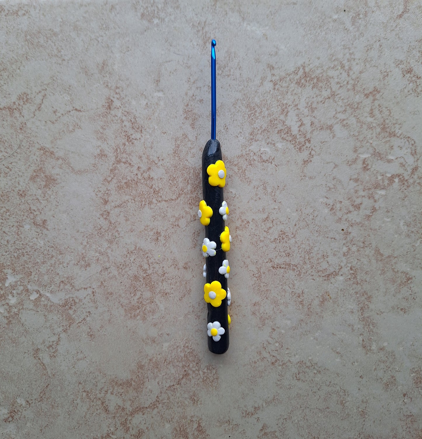 Polymer clay black yellow white daisy crochet hook