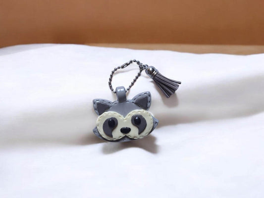 Polymer clay raccoon faux leather look stitch style keychain / cute clay raccoon bag accessories key chain