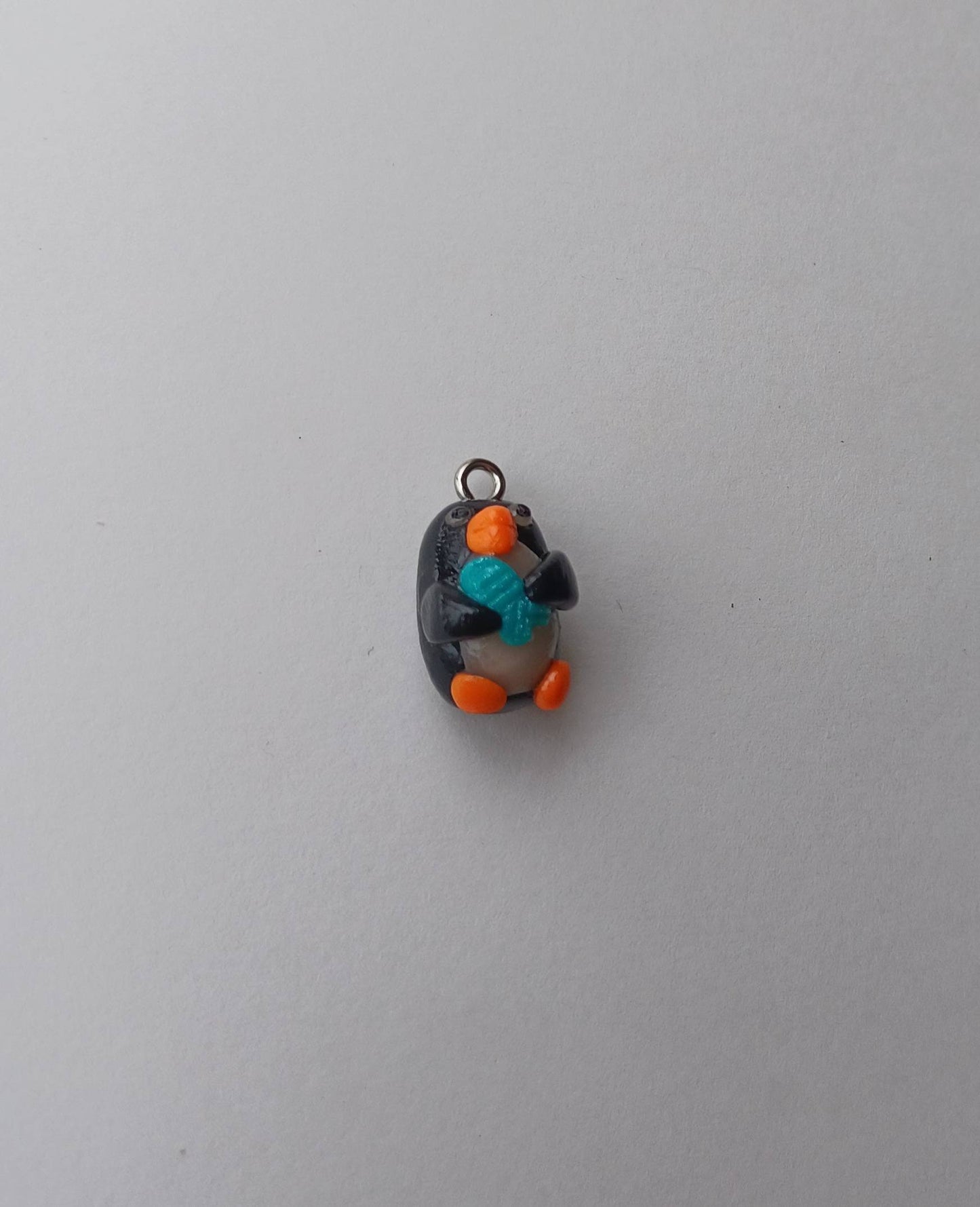 Kawaii penguin charms / polymer clay penguin holding fish charms / kawaii animal charms / kawaii penguin jewelry