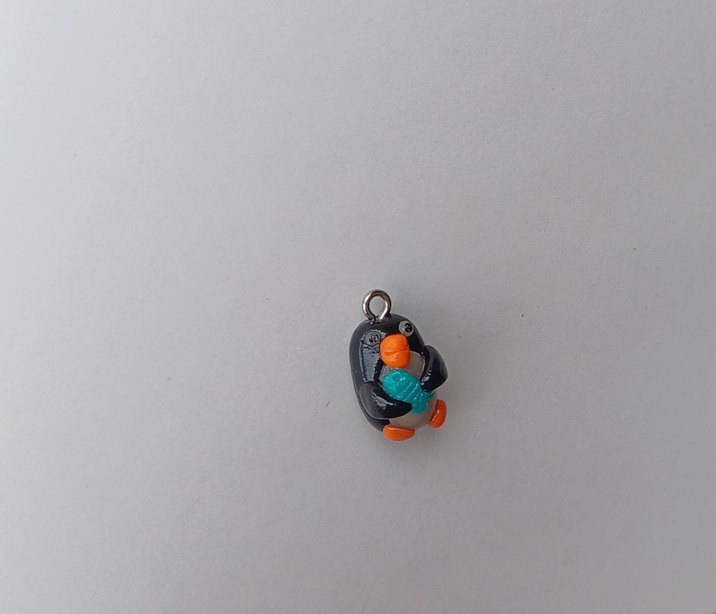 Kawaii penguin charms / polymer clay penguin holding fish charms / kawaii animal charms / kawaii penguin jewelry