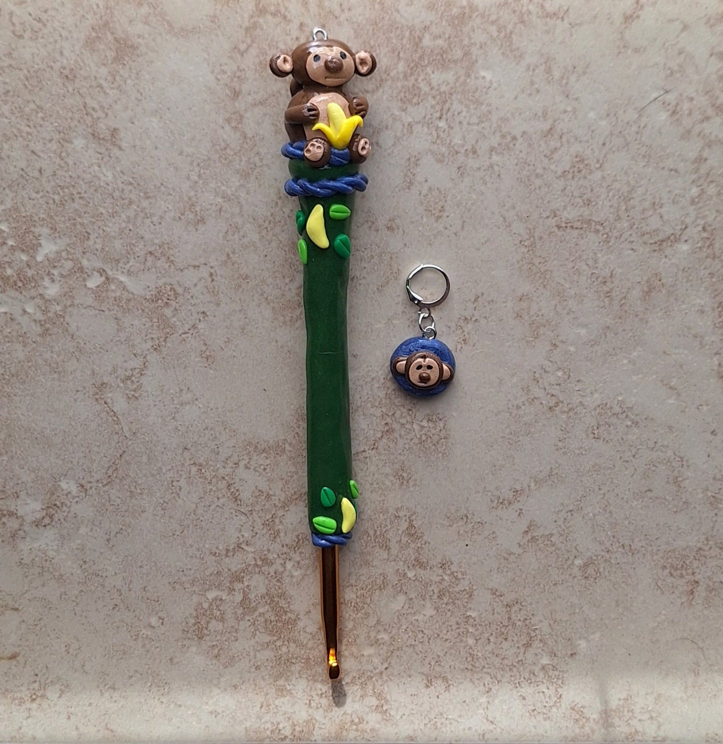 Polymer clay monkey banana jungle crochet hook with stitch marker