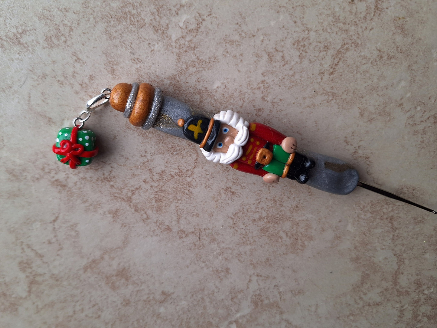 Polymer clay silver gold marbled nutcracker holiday Christmas crochet hook with stitch marker
