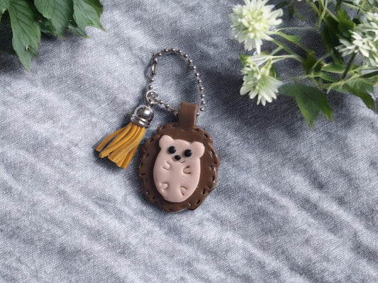 Polymer clay hedgehog faux leather look stitch style keychain / cute clay hedgehog bag accessories porcupine key chain