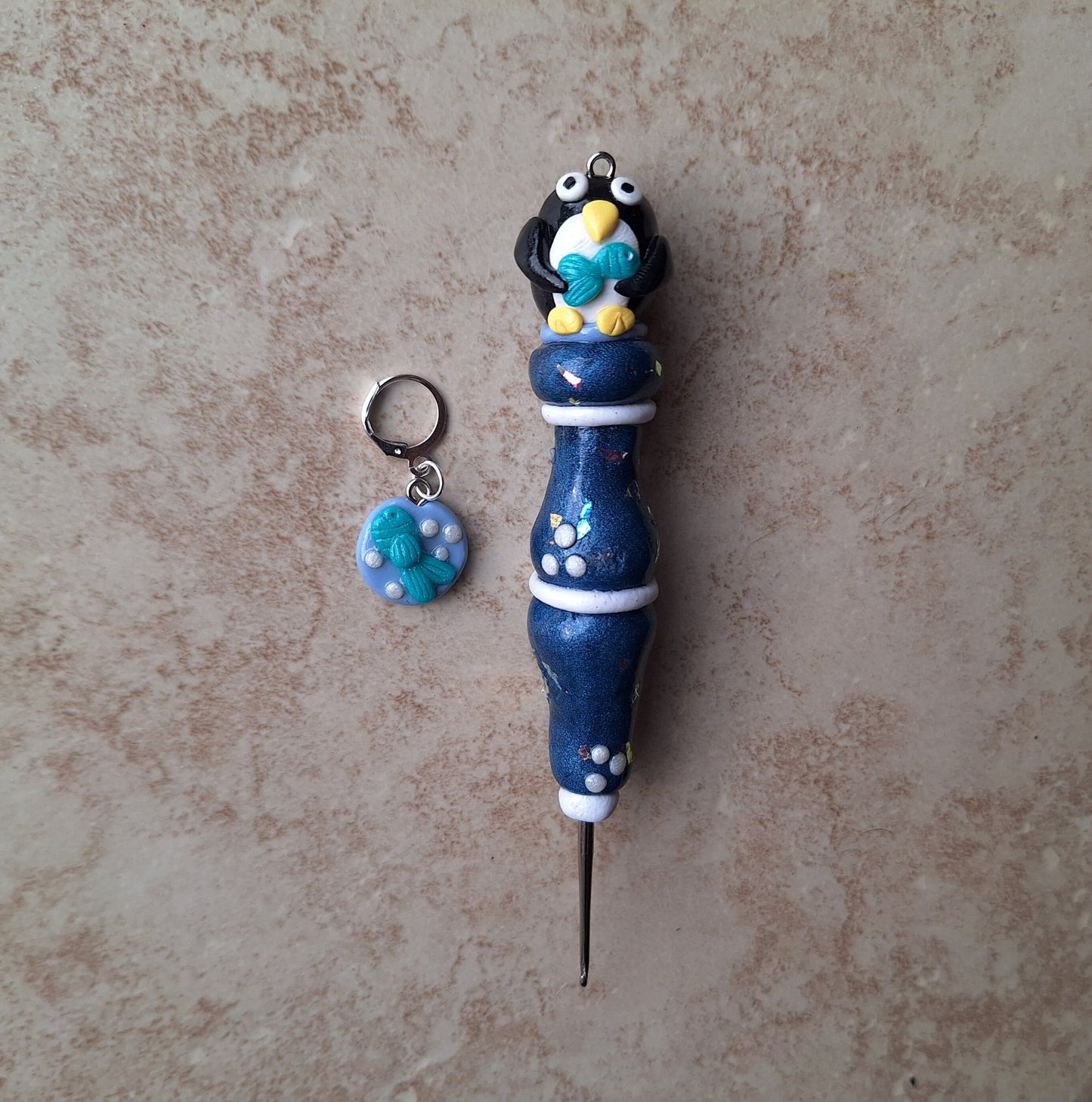 Polymer clay navy pearl penguin crochet hook with stitch marker