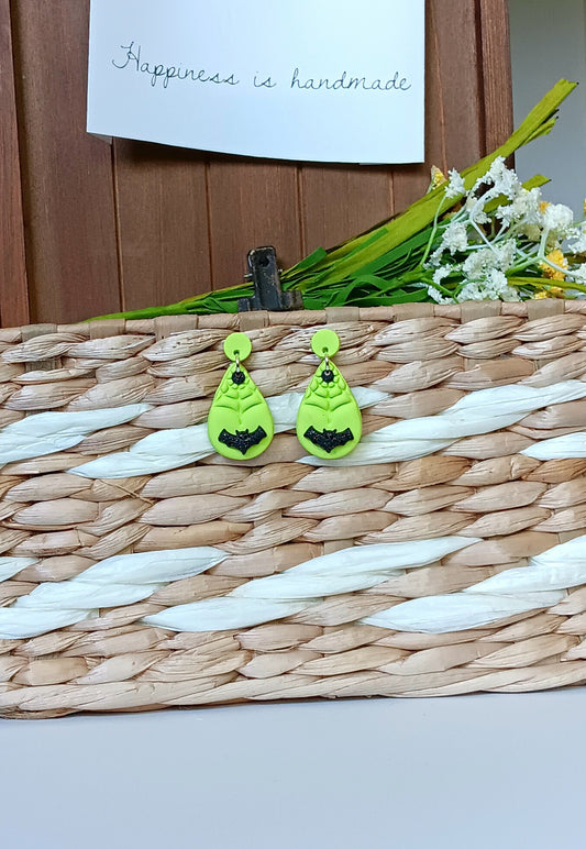 Kawaii green spiderweb bat earrings / polymer clay dangle stud holiday earrings / flying bat halloween holiday jewelry / spider web earrings