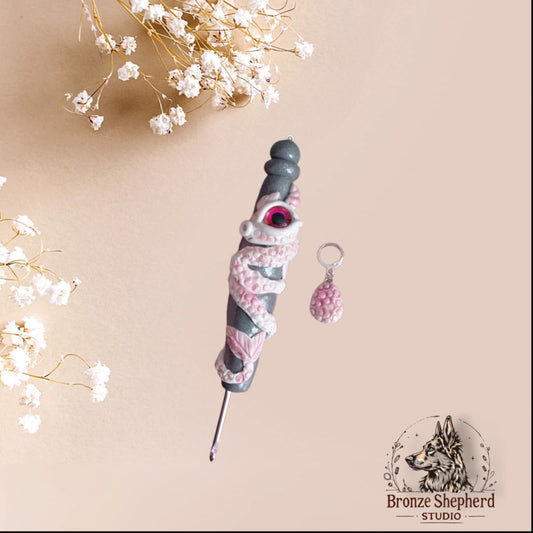 Polymer clay pink red white dragon and egg crochet hook with stitch marker