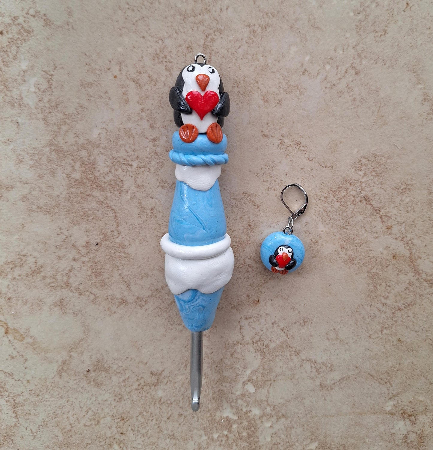 Polymer clay icy heart penguin crochet hook with stitch marker