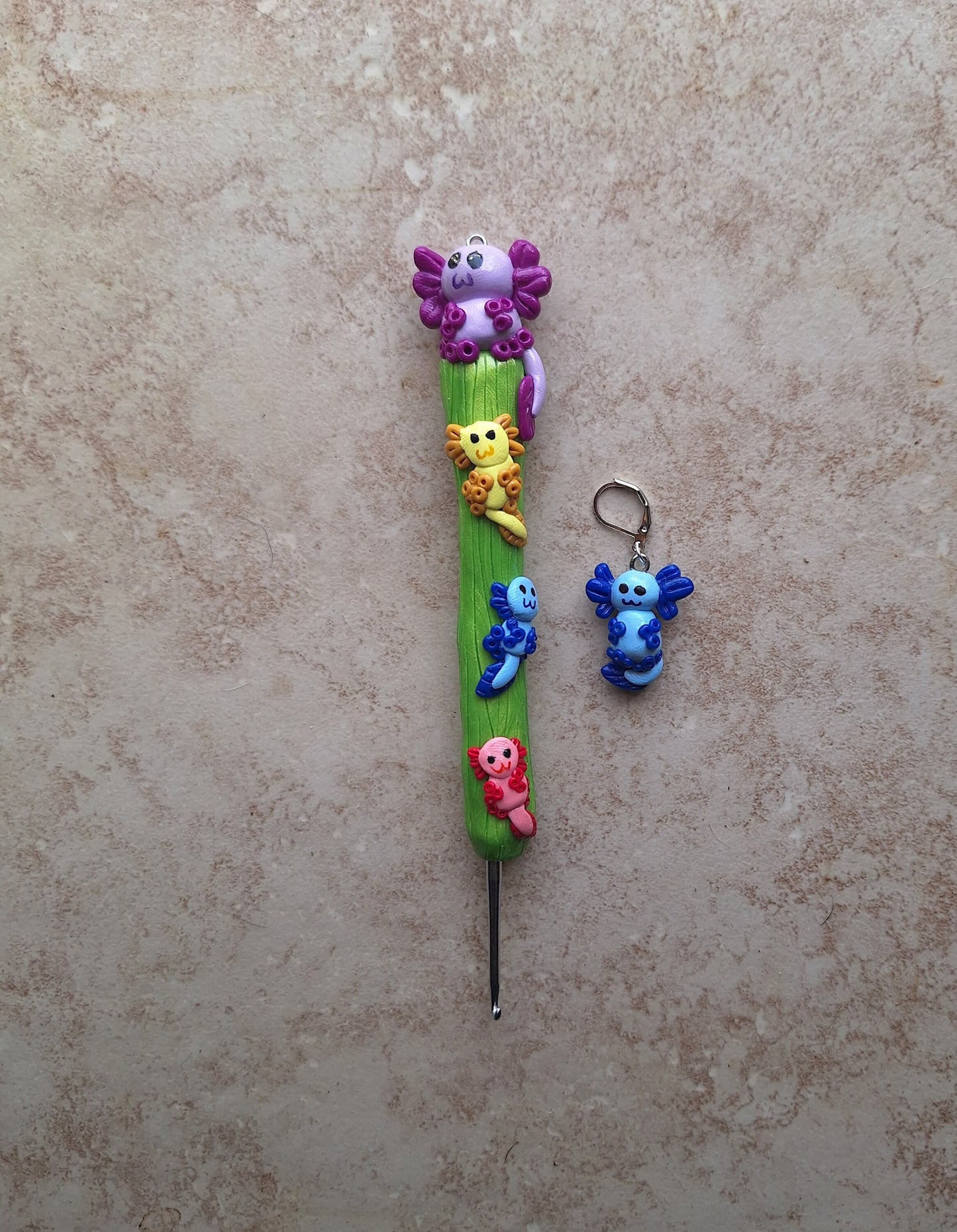 Polymer clay colorful axolotl crochet hook with stitch marker