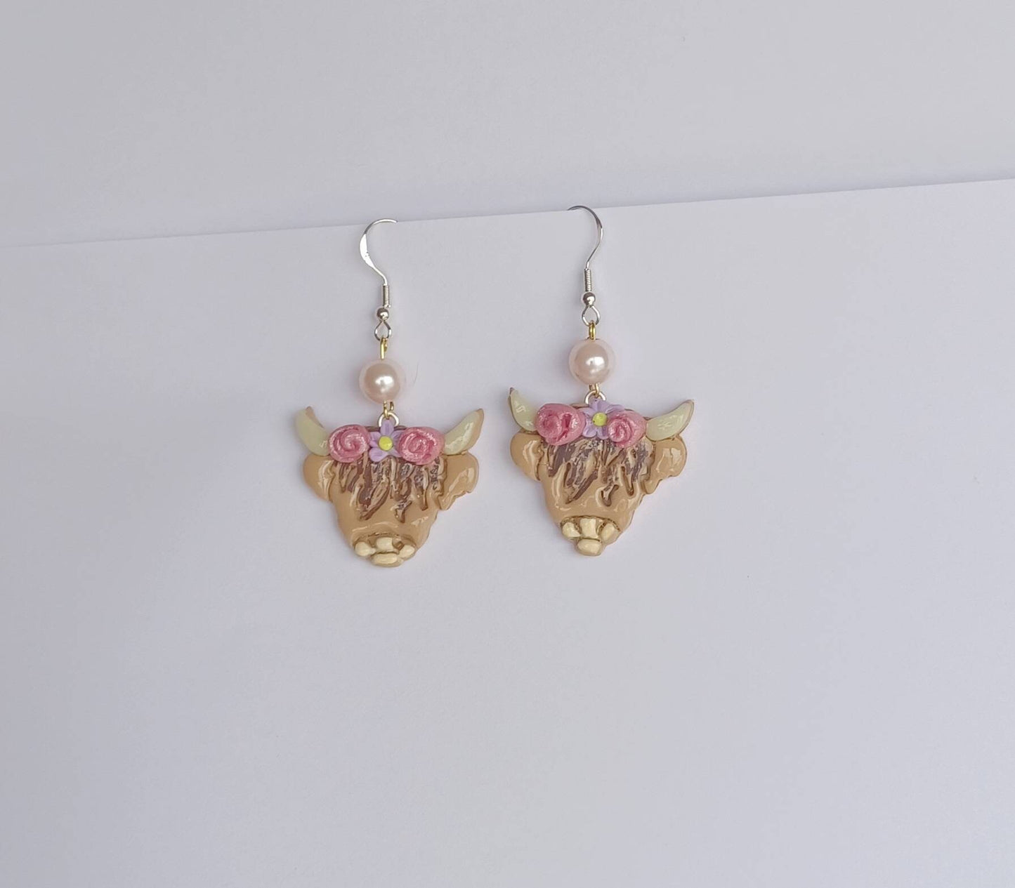 Kawaii floral cow earrings / polymer clay highland cow earrings / kawaii animal jewelry / floral earrings / floral Highland cow earrings