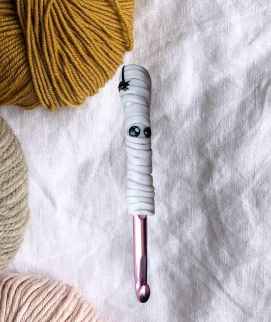 Polymer clay Halloween mummy with spider crochet hook
