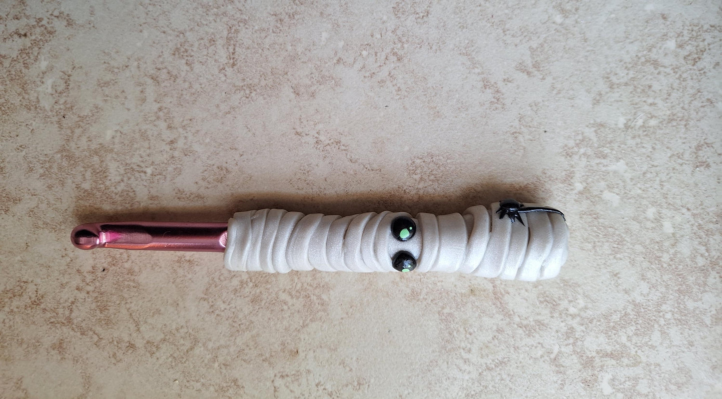 Polymer clay Halloween mummy with spider crochet hook