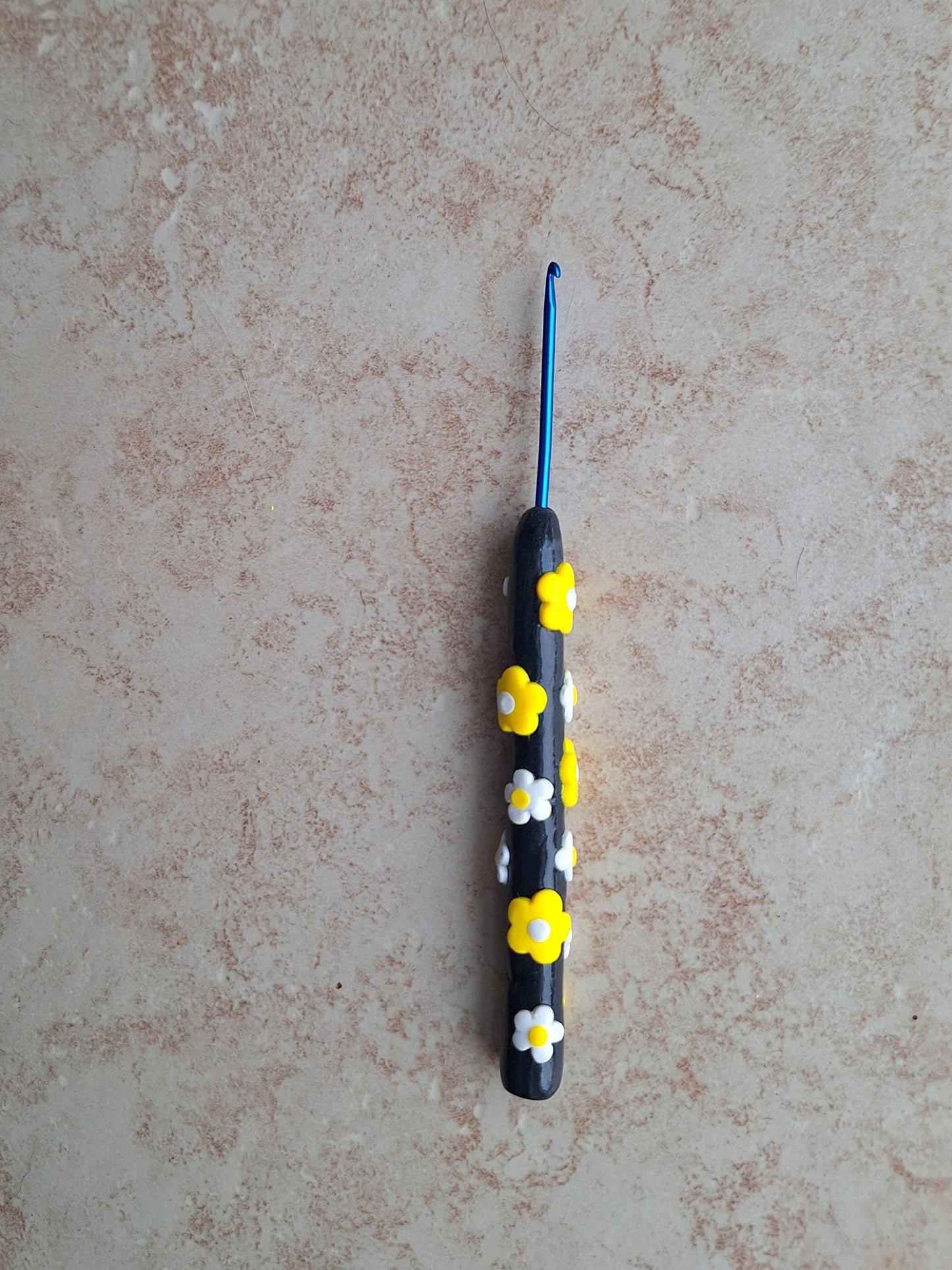 Polymer clay black yellow white daisy crochet hook