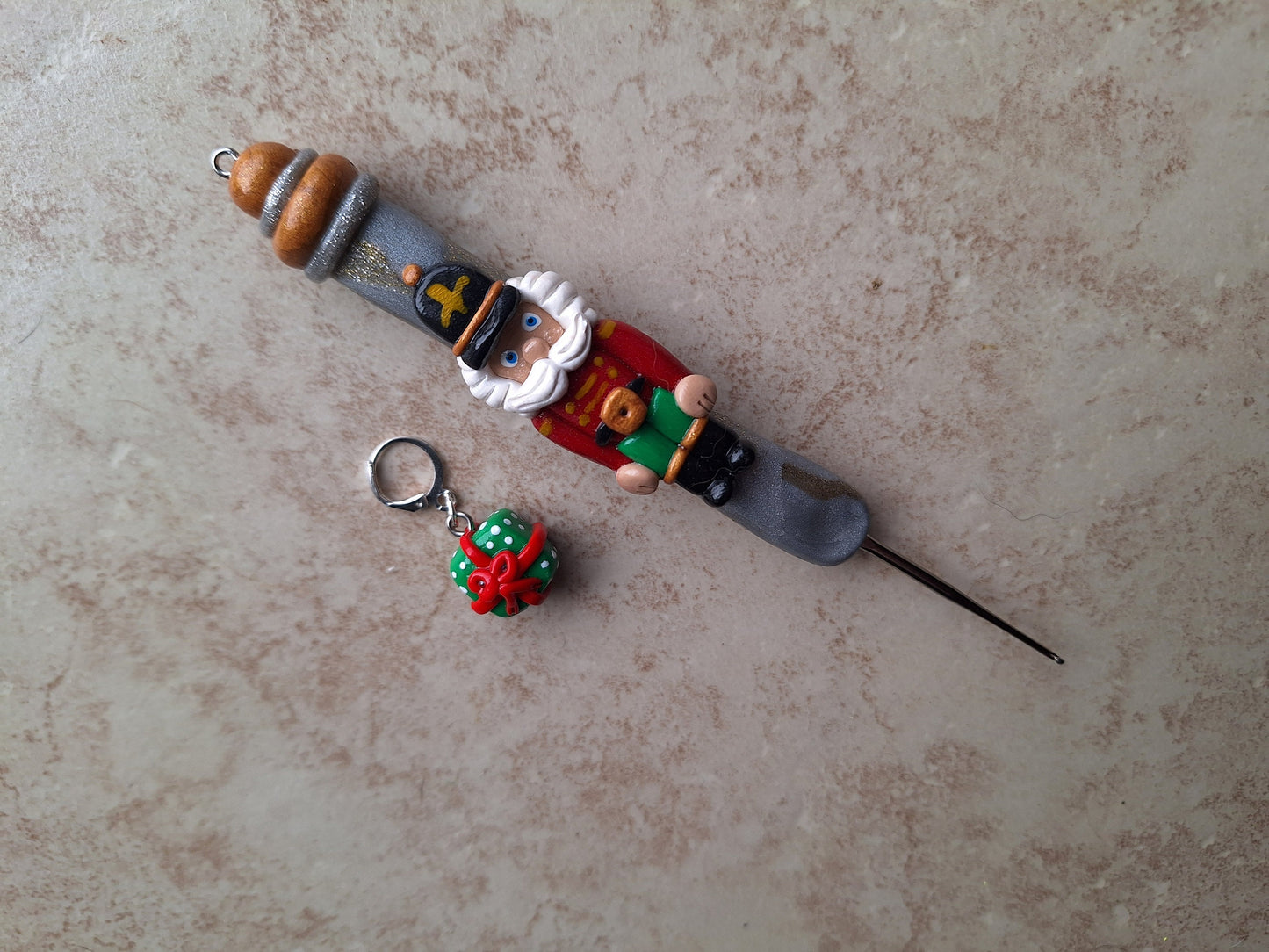 Polymer clay silver gold marbled nutcracker holiday Christmas crochet hook with stitch marker