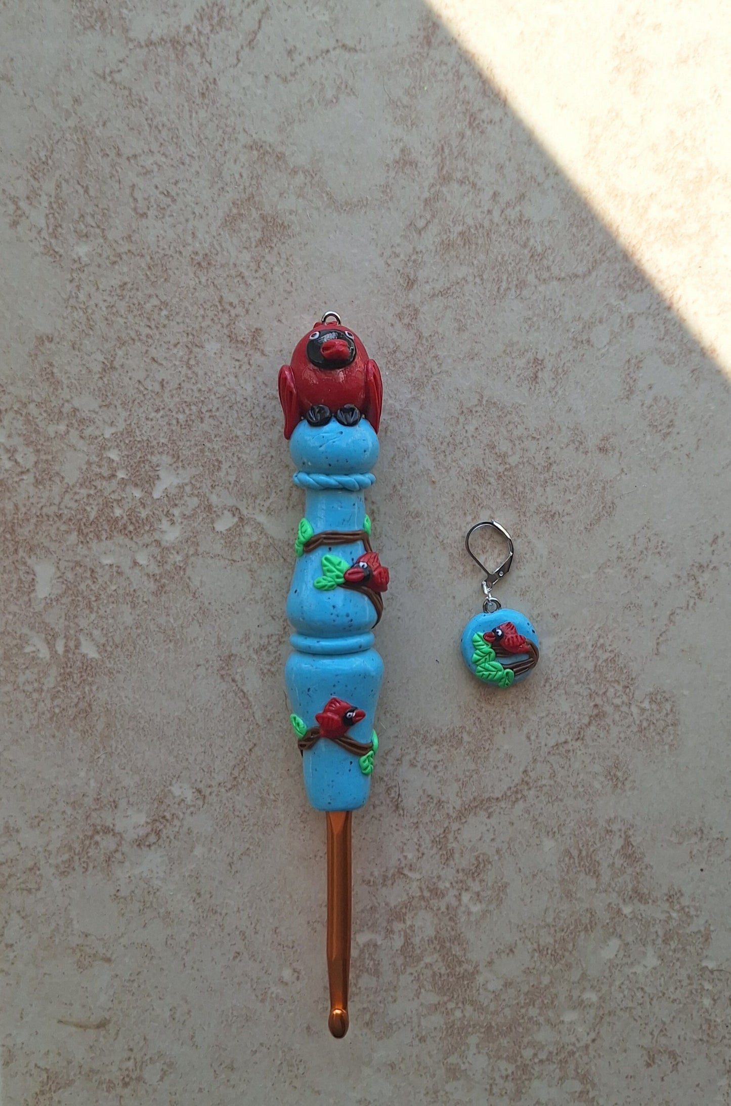 Polymer clay cardinal bird on turquoise clay crochet hook