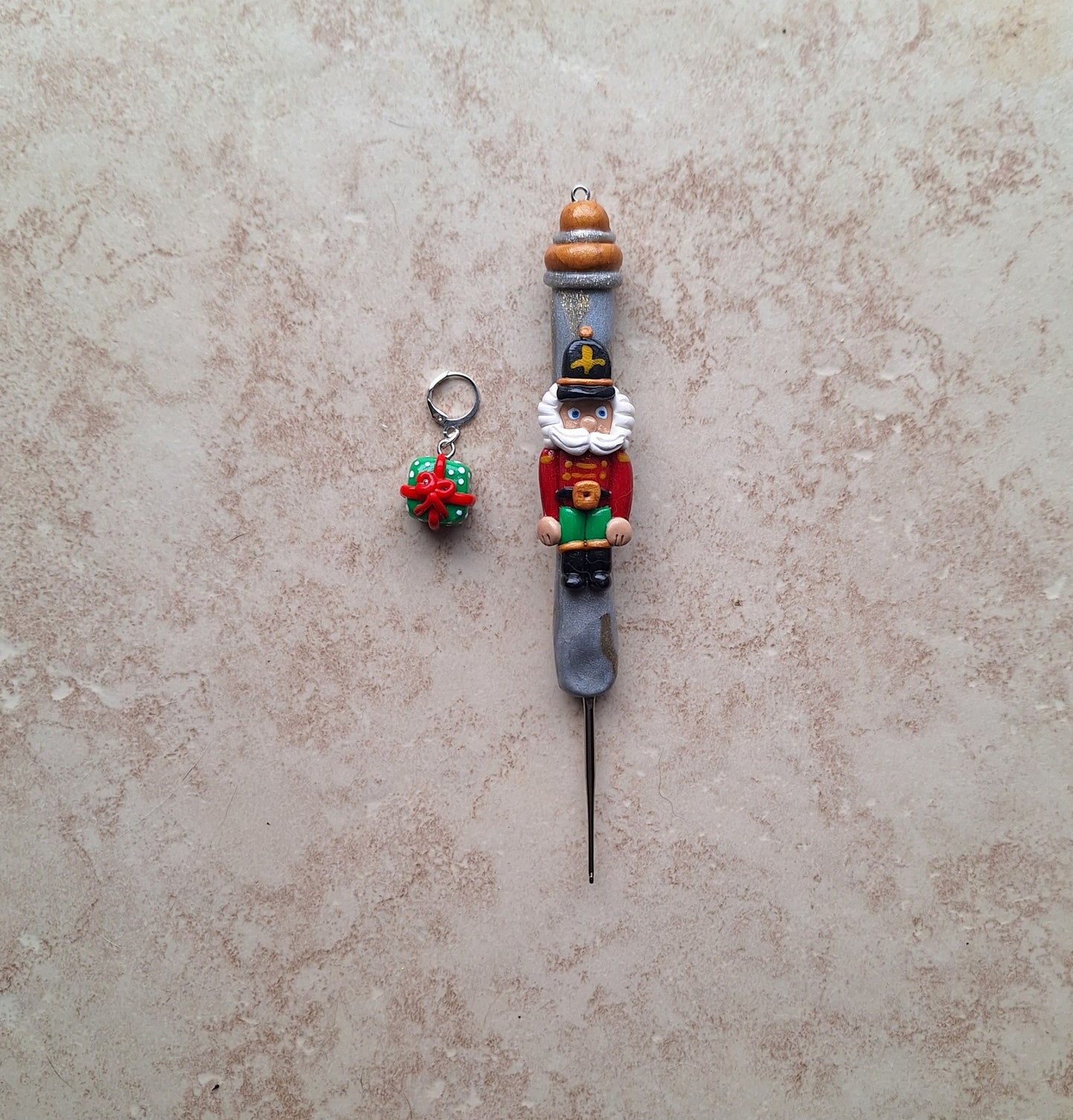 Polymer clay silver gold marbled nutcracker holiday Christmas crochet hook with stitch marker
